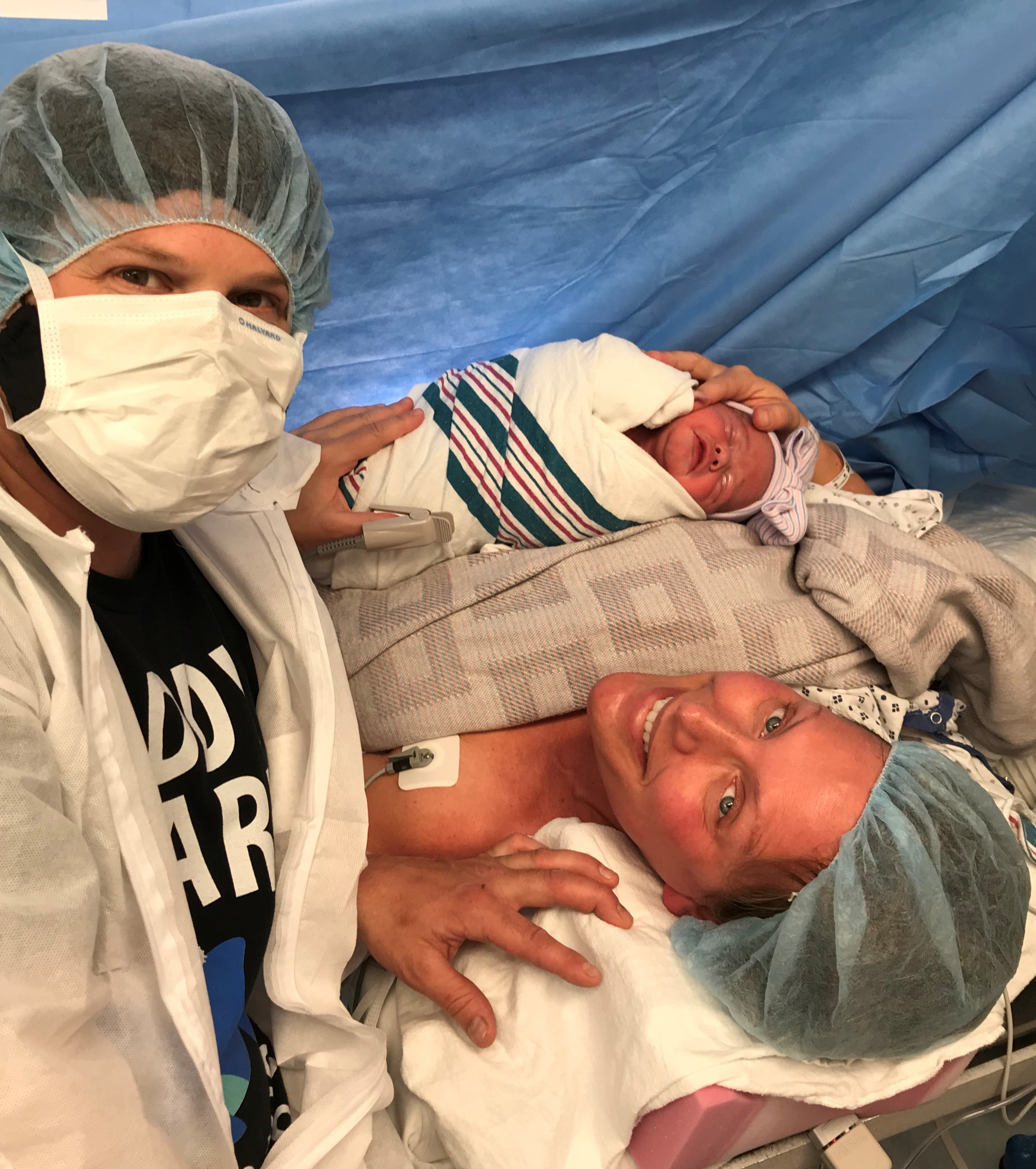 Mom, Kimm, holds new baby Elin in Pennsylvania Hospital